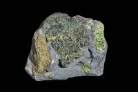 Nodules de péridotite dans un bloc de basalte